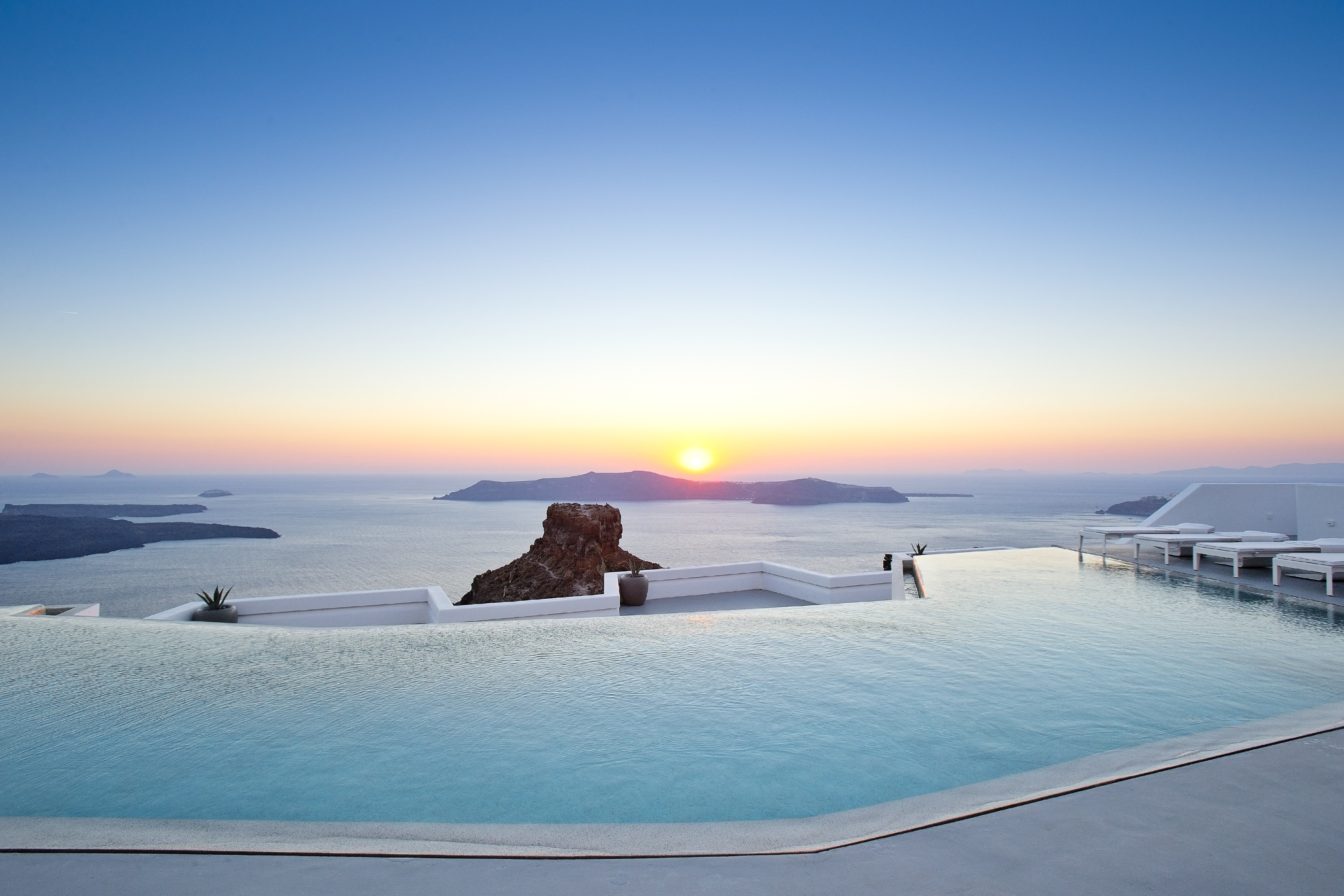 Grace Santorini Infinity Pool at Sunset